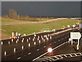 SK7448 : Elston: sunshine and showers on the A46 by Chris Downer