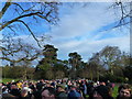 TF6928 : Crowd along Church Walk Sandringham - Christmas Day 2011 by Richard Humphrey