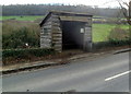 SO8706 : Wooden bus shelter south of Slad by Jaggery