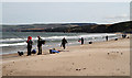 NT7574 : Sea anglers at Thorntonloch Beach by Walter Baxter