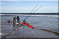 NT7573 : Sea anglers at Thorntonloch by Walter Baxter