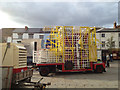 SP2864 : Fairground ride waiting to be put up, Market Place by Robin Stott