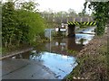 SK5680 : Flooded road at Rhodesia  by Graham Hogg