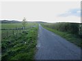 NU0035 : Country road near Wrangham by Graham Robson