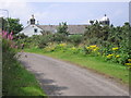 NO4529 : East lighthouse and lighthouse cottage by Sandy Gemmill