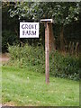 TM4072 : Grove Farm sign by Geographer