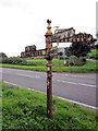 SJ5053 : Fingerpost on the A534 (Wrexham Road) by Jeff Buck