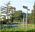 SO7502 : 3-armed signpost near Cam & Dursley railway station by Jaggery