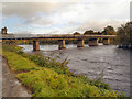 NY8677 : River North Tyne, Wark Bridge by David Dixon