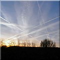 SJ9594 : Early morning contrails by Gerald England