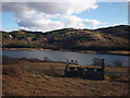 NM4752 : Ruined cottage by the road above Loch Meadhoin by Karl and Ali