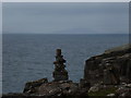 NG1246 : Neist Point: basalt pillar and an Outer Hebridean view by Chris Downer