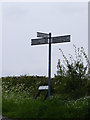 TM4088 : Roadsign on Church Road by Geographer