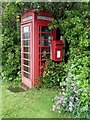 SK1065 : Telephone box and postbox, Crowdicote by Andrew Hill