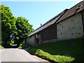 SP1055 : Barns at Glebe Farm by Nigel Mykura