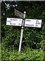 TM4380 : Roadsign on the B1124 Halesworth Road by Geographer