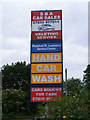 TM3883 : Ilketshall St.Lawrence Service Station sign by Geographer