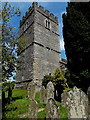 SO0842 : Gravestones and castellated tower, St Mary's Church, Crickadarn by Jaggery