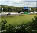 ST2988 : M4 motorway viewed from a canal path, Newport by Jaggery