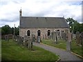 NO5597 : Churchyard path to Birse Church by Stanley Howe