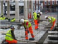 TA0339 : Laying paving stones, Market Square, Beverley by Robin Drayton