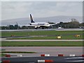 SJ8184 : EI-DLC Lands at Manchester by David Dixon