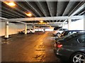 SJ9594 : Looking up the multi-storey car park by Gerald England