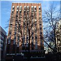 SJ8398 : Office block and winter trees, Lincoln Square by Andrew Hill