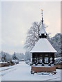 SJ4162 : Church Road and the shelter in the snow by John S Turner