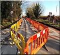 ST8993 : Yellow and orange barriers along Cirencester Road, Tetbury by Jaggery