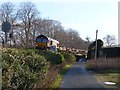 NY9265 : Goods train passing Tyne Green by Oliver Dixon