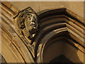 TQ3975 : Carved stone head on St Margaret's church by Stephen Craven