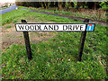 TM3388 : Woodland Drive sign by Geographer