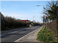 TL4605 : Speed limit signs and filling station, Thornwood Common by Stephen Craven