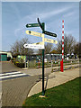 TL2668 : Signpost at Wood Green Animal Shelter by Geographer