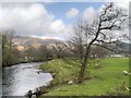 NY2523 : River Derwent, Upstream from Portinscale Bridge by David Dixon