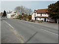 TM2222 : The Red Lion public house, The Street (B1034) by John Baker