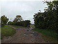 TM4893 : Footpath & entrance to Hollow Farm by Geographer