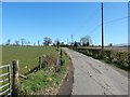 NS4283 : Road at Easter Blairquhanan by Lairich Rig