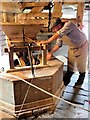 SJ4553 : Grinding the Corn at Stretton Mill by Susan Dixon