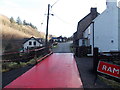 SO5200 : Icy red ramp near a road junction in the Angiddy Valley near Tintern by Jaggery