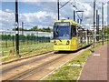 SJ8097 : Metrolink Tram, The Quays by David Dixon