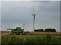 TL2891 : Combining rapeseed on Glassmoor by Richard Humphrey