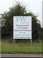 TM2899 : F W properties sign off the B1332 Norwich Road by Geographer