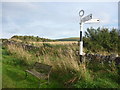 NT5565 : Rural East Lothian : Bench And Fingerpost At Baxtersyke by Richard West