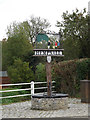 TM2494 : Hempnall Village sign by Geographer