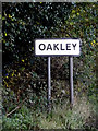 TM1777 : Oakley Village Name sign on the B1118 by Geographer