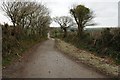 SW8954 : Country road near Goonabarn by Philip Halling