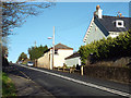 SX9574 : Teignmouth Road climbs past Holcombe by Robin Stott