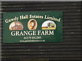 TM2585 : Grange Farm sign by Geographer